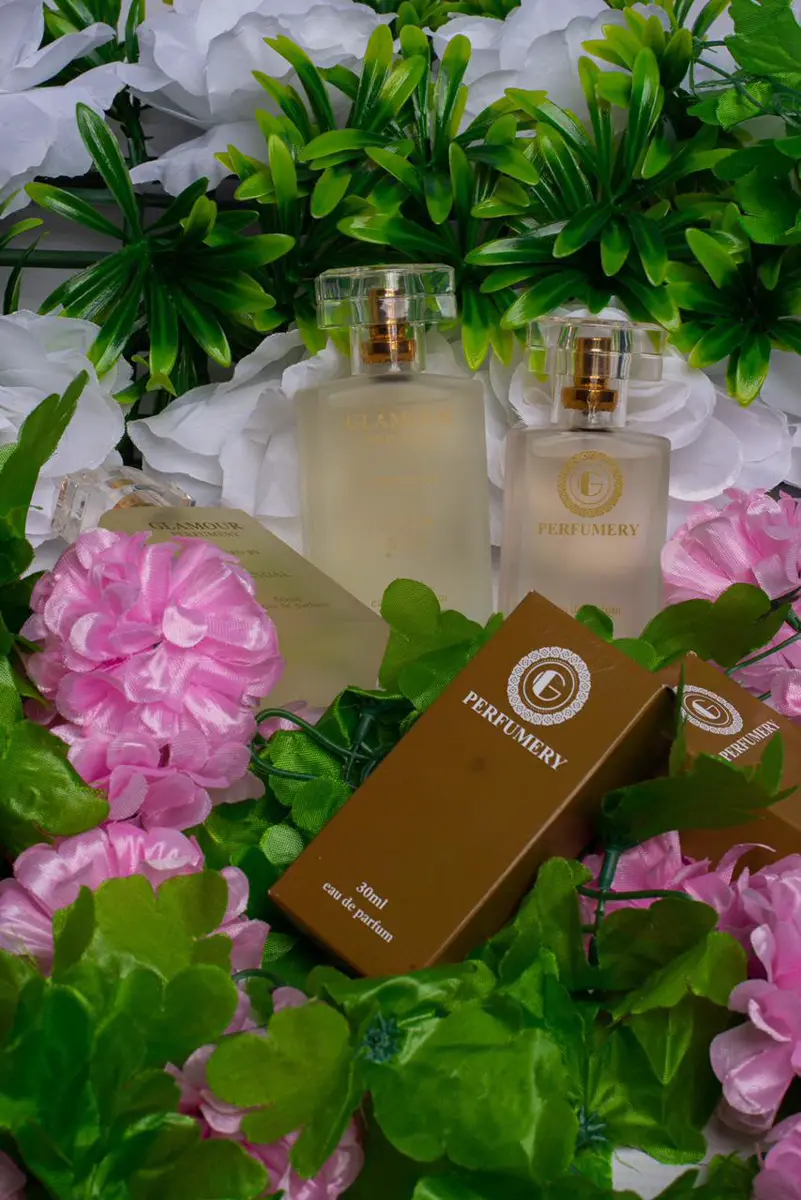 Glamour Perfumery eau de parfum bottles and boxes with flowers